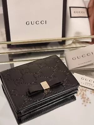 $550 • Buy Gucci GG Black Bow Ribbon Wallet Purse - Guccissima Embossed Leather