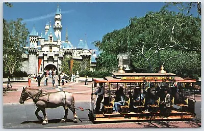Postcard Anaheim CA Disneyland Castle Night Horse Drawn Streetcar DI06 • $5.99