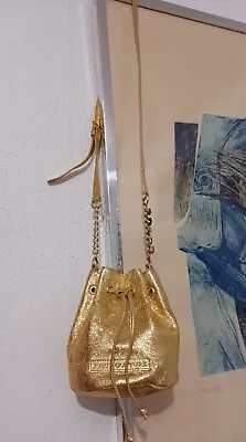 NWT Juicy Couture Gold  Drawstring Bucket Bag  Crossbody.  • $120