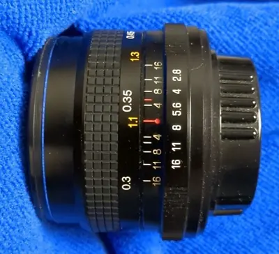 Asanuma 28mm F/2.8 Lens With Pentax M42 Screw Mount And Front And Rear Lens Caps • $45