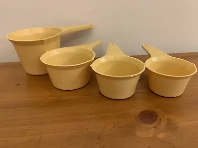 Set Of 4 Vintage Foley Measuring Cups Scoops Spout Harvest Gold Yellow  USA • $9.95