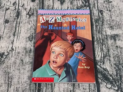 A To Z Mysteries The Haunted Hotel Paperback Book By Ron Roy • $6.19