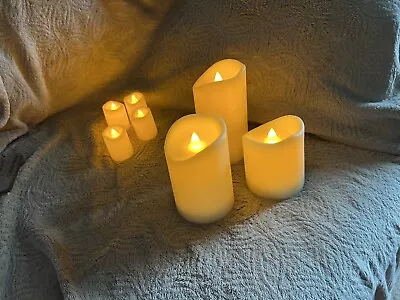 Set Of 7 Flameless Candles • $20