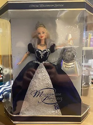 Millenium Holiday Barbie • $1000