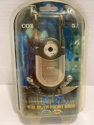 2007 COBY CX-7 Mini AM/FM Pocket Radio DBBS Earphone Belt Clip Neck Strap NIP • $6.29