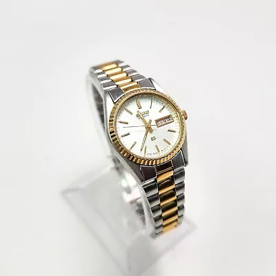 Vintage Seiko Quartz SQ Analog Day/Date And Time Water Resistant Wrist Watch • $325