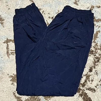 Vintage 90s Nike Nylon Track Pants Navy Blue Size Large Zip Leg Athletic Workout • $35