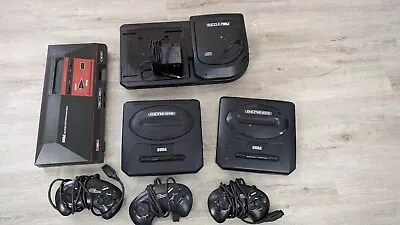 Sega Console Lot Sega CD Model 2 Master System Genesis 3 Official Controllers  • $52