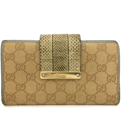 $75 • Buy Gucci Canvas Leather Python Bifold Wallet