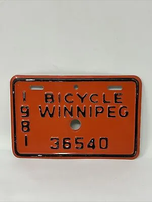 Vintage Bicycle License Plate 1981 WInnipeg Manitoba Canada Orange Black 36540 • $12.99