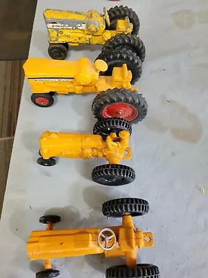 4 Minneapolis Moline Toy Tractors • $36