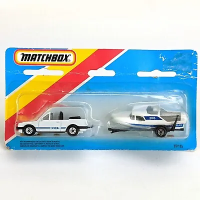 Matchbox Superfast TP-115 Ford Escort XR3i With No. 9 Boat  SEASPRAY  On Card • £39.95