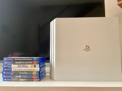 $300 • Buy Sony PlayStation 4 Pro 1TB - White + Controllers + Games