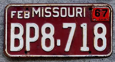 1962 White On Maroon Missouri License Plate With A 1967 Sticker • $12.68