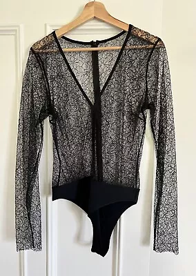 Bec & Bridge Black Lace Bodysuit • $10