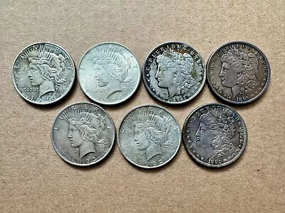 Lot Of 7 Circulated 90% Silver Dollars 3 Morgan 4 Peace • $144.50