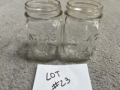 Two Atlas Pint Mason Jars (lot #23) • $18