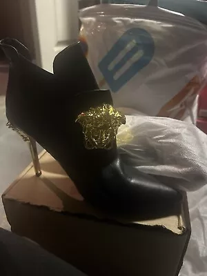 Versace Heels • $75