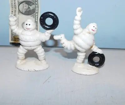 2 Michelin Men Man Figures Statues Lifting Rolling Rubber Tires • $3.99