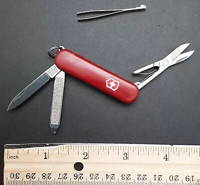 Red VICTORINOX SwissLite Swiss Army Knife W/Scissors & Red Flashlight • $12.82