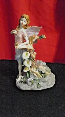 7” Tall Vintage Garden Fairy Music Box Lillies Brown Hair Great Condition  • $7