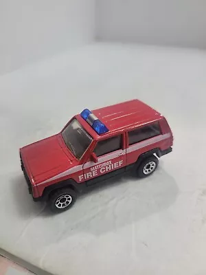 Matchbox Jeep Cherokee Fire Chief Car RED Diecast Loose 1/64 • $22