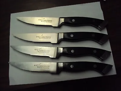 Four LONGHORN STEAKHOUSE Steak Knives Heavy Weighted W/ Logo Serrated 10.75   • $45