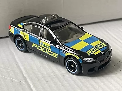 1/64 Matchbox 2014 BMW M5 Police Car Rubber Tyres • £8