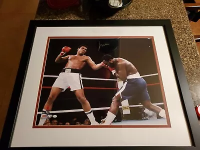 Muhammad Ali Punching Joe Frazier • $1075