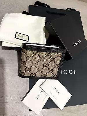 $510 • Buy Brand New Gucci GG Canvas Leather Men`s Bifold Wallet  Brown/Beige