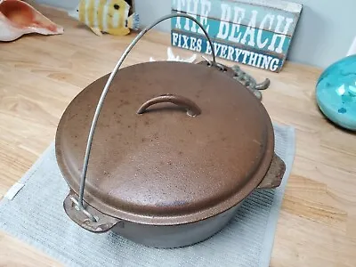 Vintage Oriental #10 12” Cast Iron Dutch Oven W Taper Top Cover Helper Handle  • $55