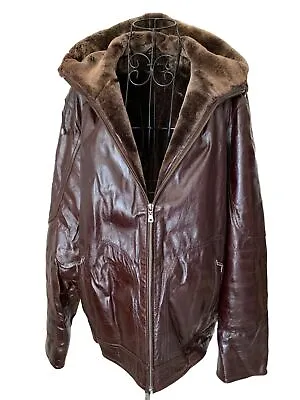 Men’s Leather Jacket With Hood And Fur Trim • $250