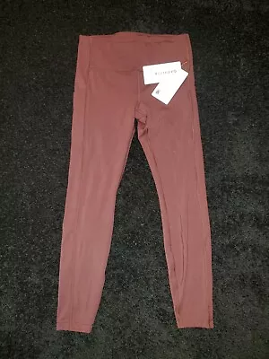 Athleta M MEDIUM Ultimate Stash Pocket 7/8 Tight Leggings Spiced Cabernet NEW • $51.95