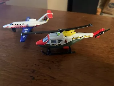 Lot (2) Matchbox:Cessna Citation Plane DARE Resist Drugs Smokey Bear Helicopter • $24.95