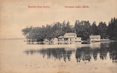 Fremont Lake Michigan~Martins Boat Livery Reflects In Water~Men On Dock~1908 PC • $11