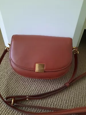 $150 • Buy Oroton Leather Voyage  Saddle Crossbody Bag Rrp $349
