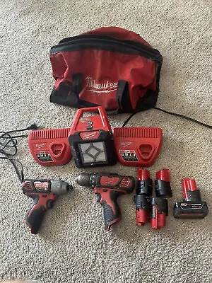 Milwaukee M12 (2)-Tool Combo Kit • Drill Impact Driver (2) Batt. Charger Bag • $215