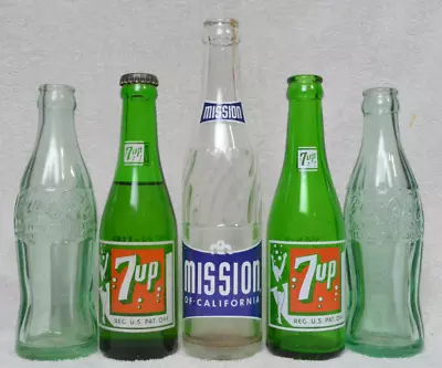 LOT Bozeman Montana Soda Bottles ACL Embossed Coca Cola 7UP Mission Beverages • $49.99