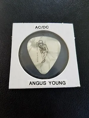 AC/DC Rare Guitar Pick (Let There Be Rock World  Tour 1977 ).  • $235