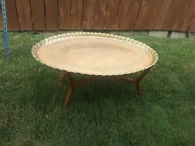 Vintage Mid Century Brass Table Brass Used Moroccan. Walnut Legs.  • $700