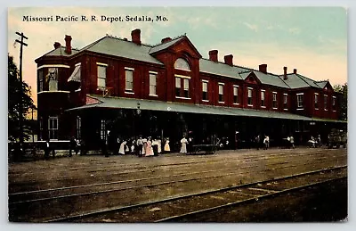 Sedalia~Varied Passengers Await Trains~Benches~Missouri Pacific RR Depot~1913 • $11