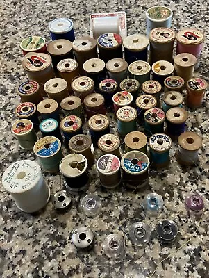 Assorted VintageMostly WoodenSewing SpoolsMetal & Plastic Bobbins. • $10