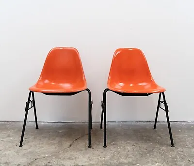 Pair Of Mid Century Herman Miller Fibreglass Eames DSS Stacking Chairs In Orange • £320