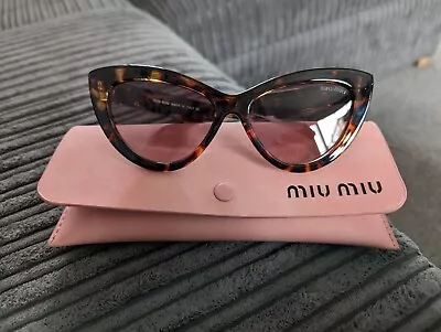 Miu Miu Sunglasses Women • £75