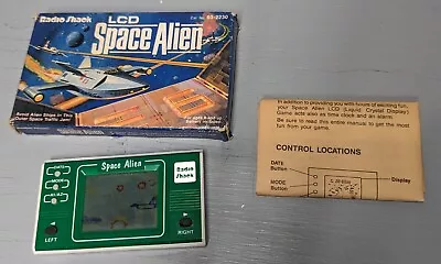 Complete Vintage Space Alien Handheld LCD Electronic Game 1989 RadioShack Tandy • $30