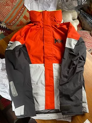 Helly Hansen Men’s Regatta Sailing Jacket In Orange And Black • £130