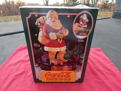 Vintage Christmas Coca-Cola Santa Claus Metal Mechanical Coin Bank Train 1993 • $9.99