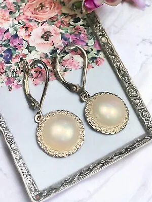 925 Sterling Silver White Mabe Pearl Sterling Diamond Halo Pierced  Earrings • $98