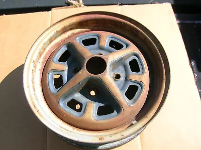 MGB 14x5 Steel Wheel In Good Cnd.Needs Media Blast & Paint.No Damage.Rostyle. • $50