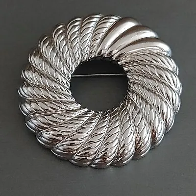 Vintage MONET Circle Brooch Pin Silver Tone Wreath Spinning Texture Modern 1.5” • $15.95